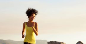 active-young-woman-running-outdoors-PTPW5PC