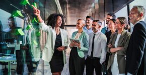 Group of business people start up team work brainstorming using post it in the office on a happy collaboration meeting. Businesswoman explaining the new marketing strategy or plan to her coworkers. High quality photo